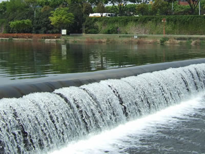 Water is incited by flip bucket, upstream and downstream have water.