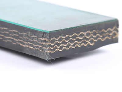 The corner of rubber dam which four layers cloth in five layers rubber and one layer green protective layer on the top.