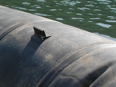 Spoilers on a piece of black spoiler rubber dam bag.